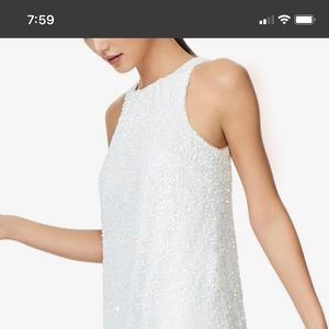 Halter sequin mini cocktail dress by Aidan Mattox.